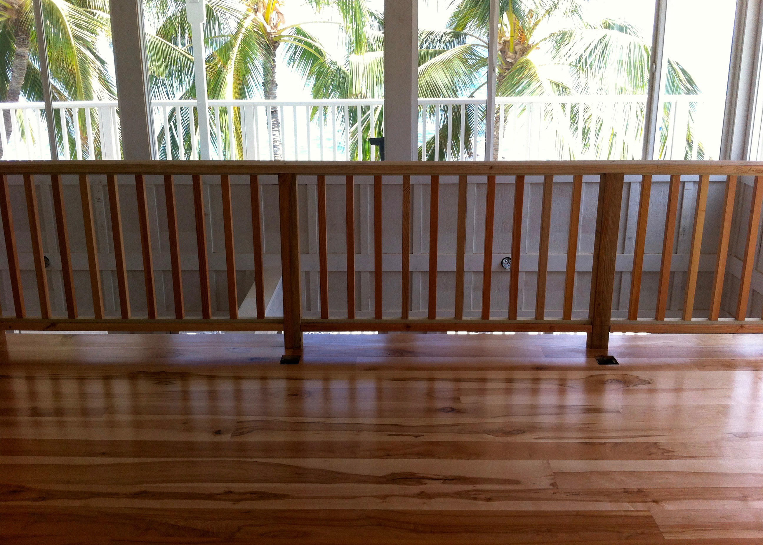 Character Grade Maple hardwood flooring on balcony in Lahaina Maui