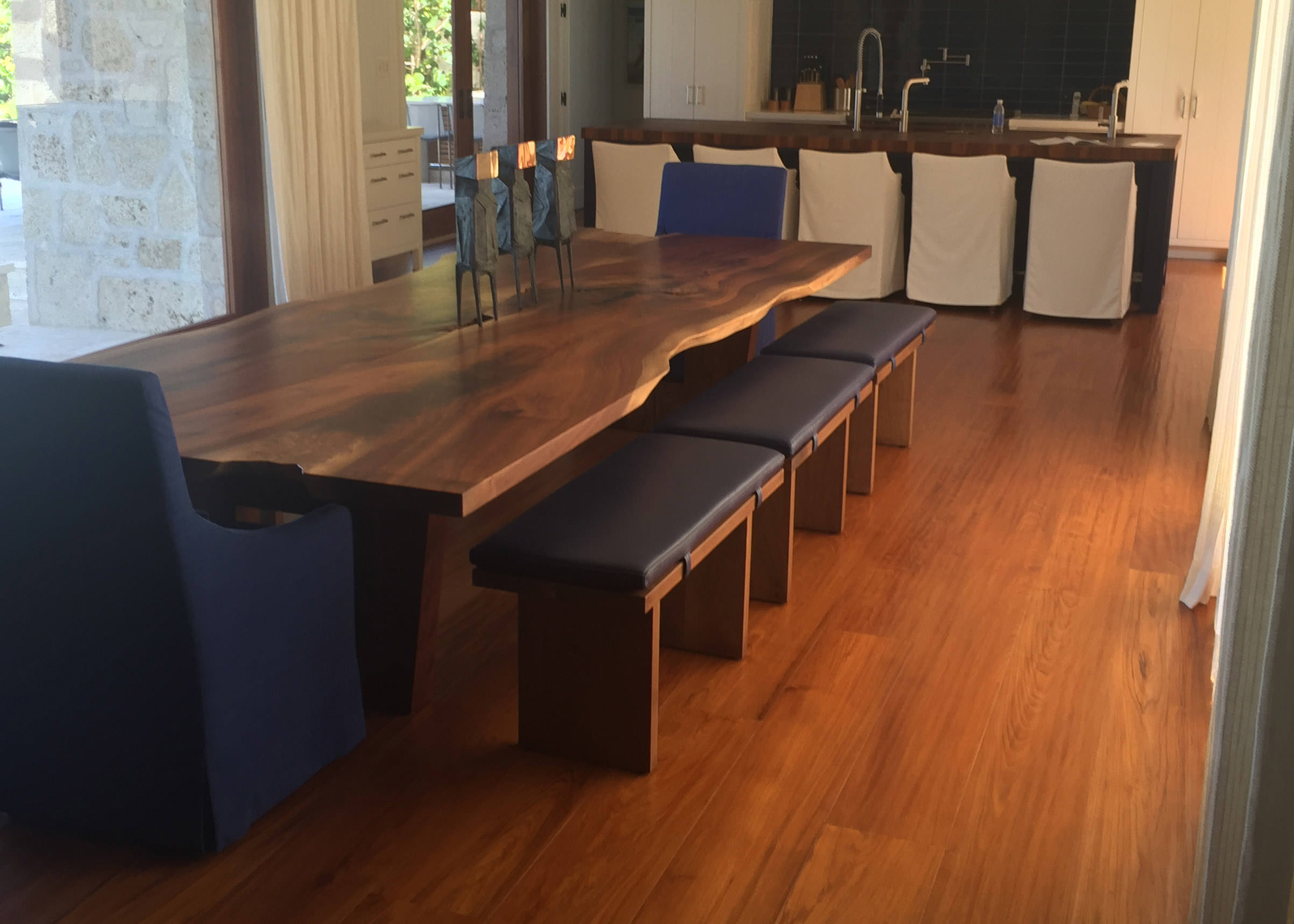 Hardwood flooring compliments dining and kitchen rooms in Wailea Maui